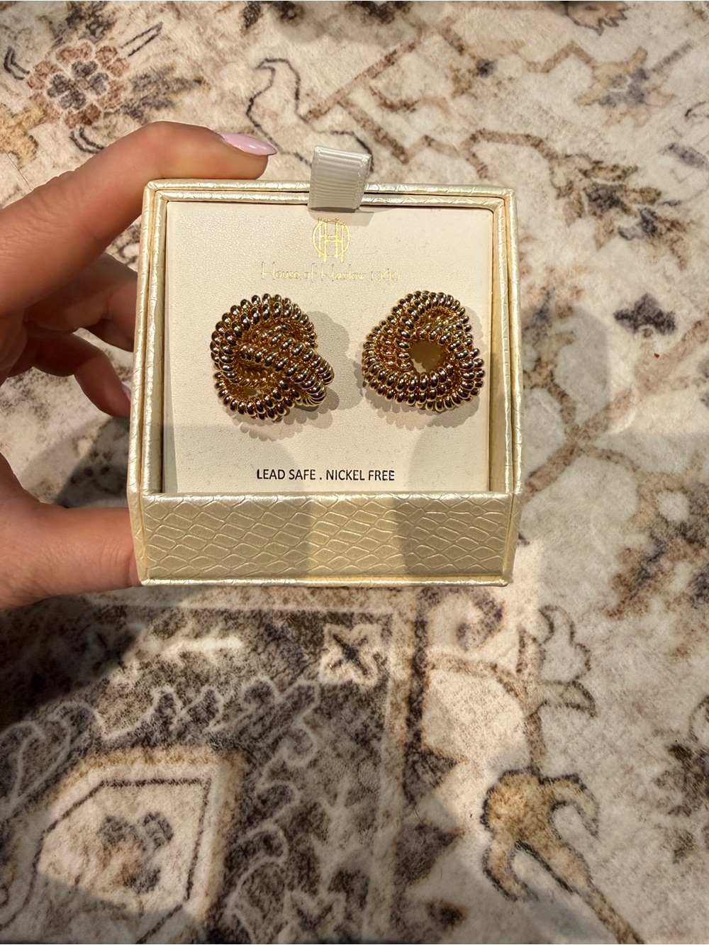 House of Harlow earrings